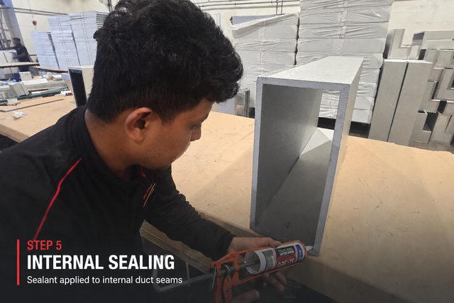 Step 5, internal sealing: a fabricator running a sealant gun along the inside corner of a finished duct section. Sealant applied to internal duct seams.